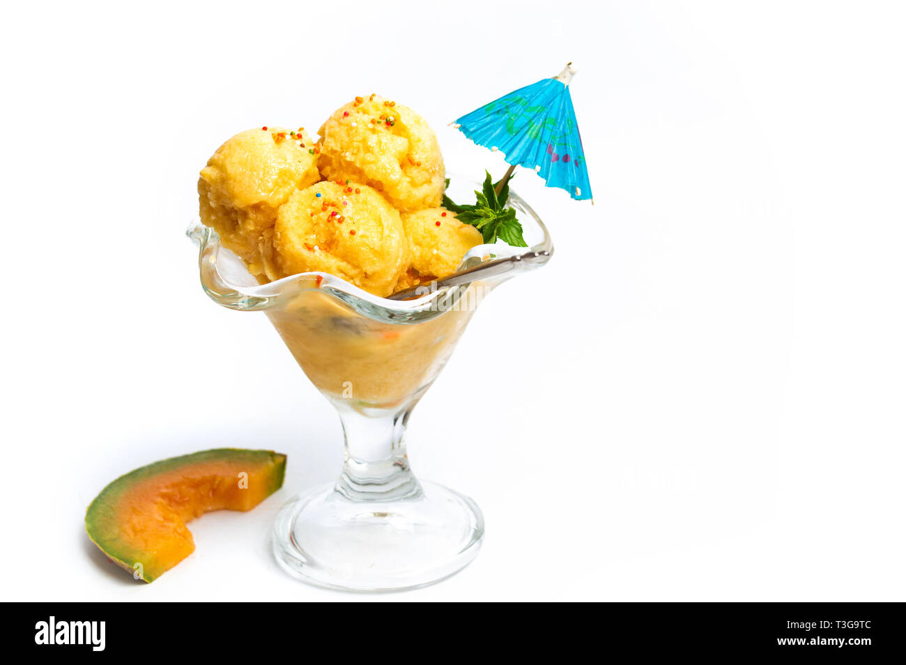 Sweet melon ice cream dessert on white isolated Stock Photo
