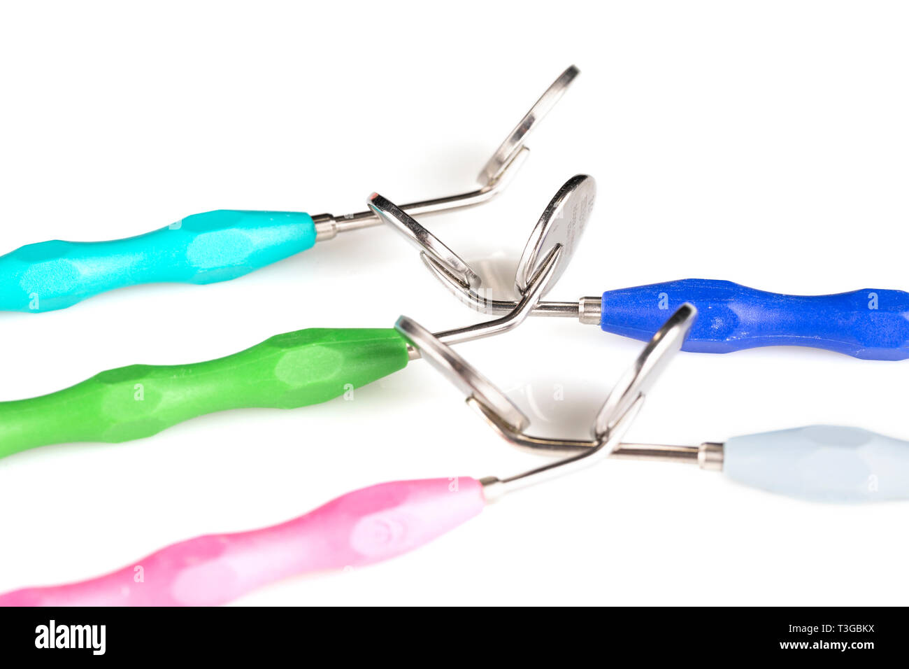 Dental mirrors close up on white background Stock Photo