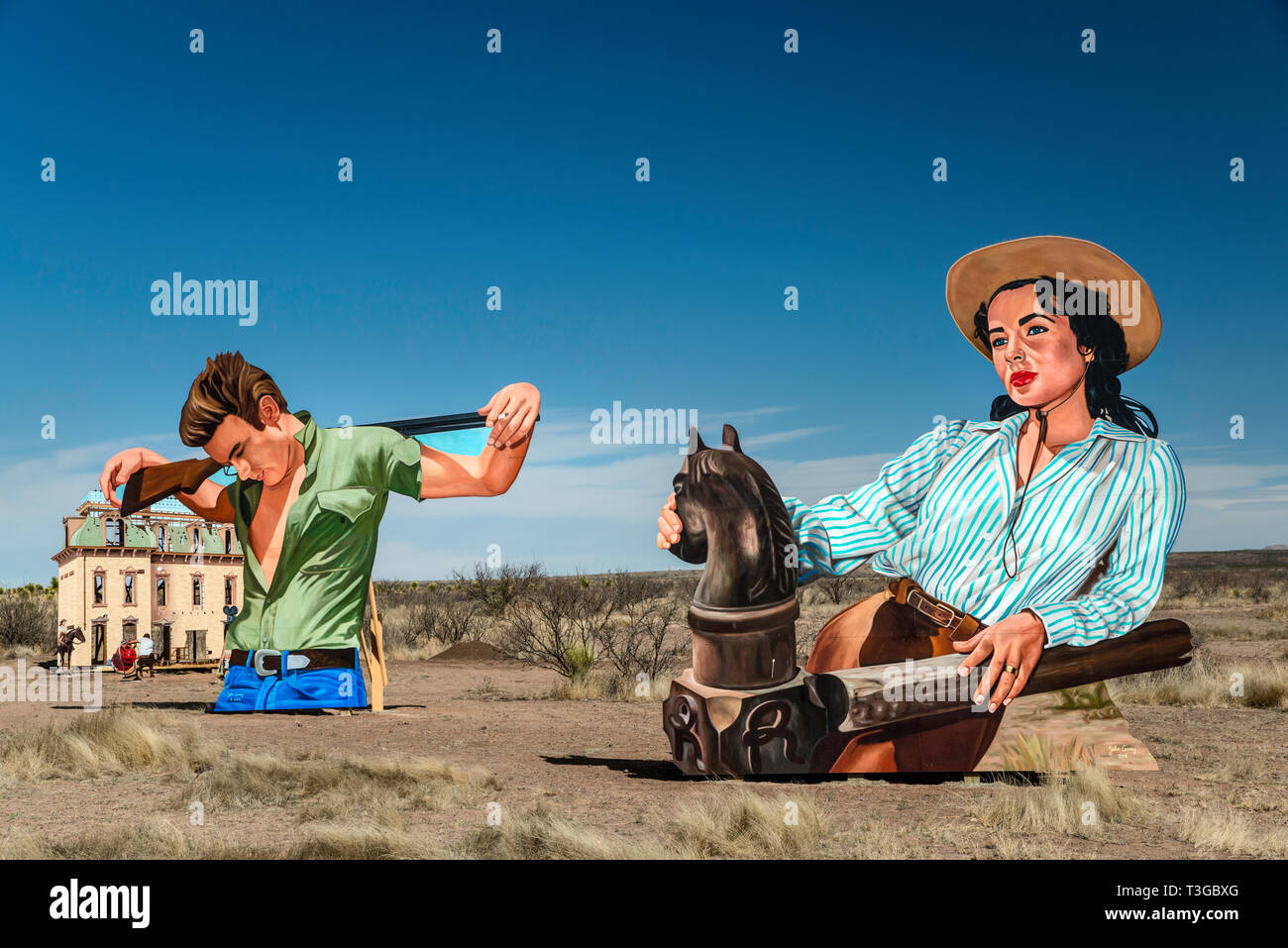 Giant Marfa, outdoor roadside mural, showing Liz Taylor and James Dean in scenes from Giant movie, created by John Cerney, near Marfa, Texas, USA Stock Photo