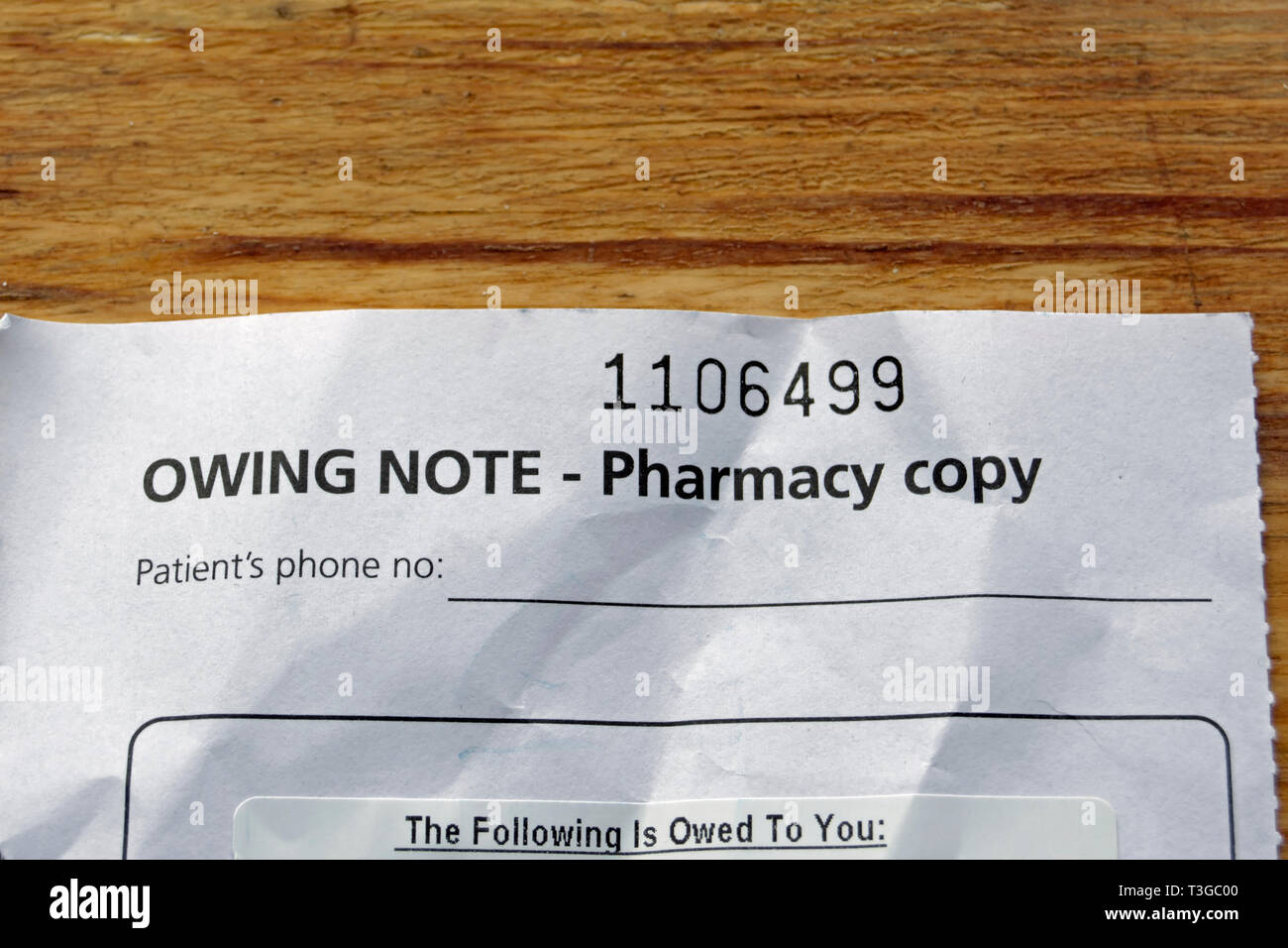 detail of a numbered owing note from a british pharmacy, used to list medicines prescribed but currently unavailable Stock Photo