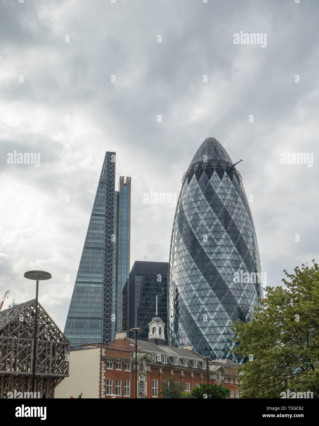 ‘Gherkin’ and ‘Cheese Grater’ skyscrapers from street level Stock Photo