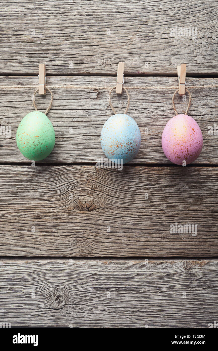 Easter eggs attach to rope with clothes pins Stock Photo