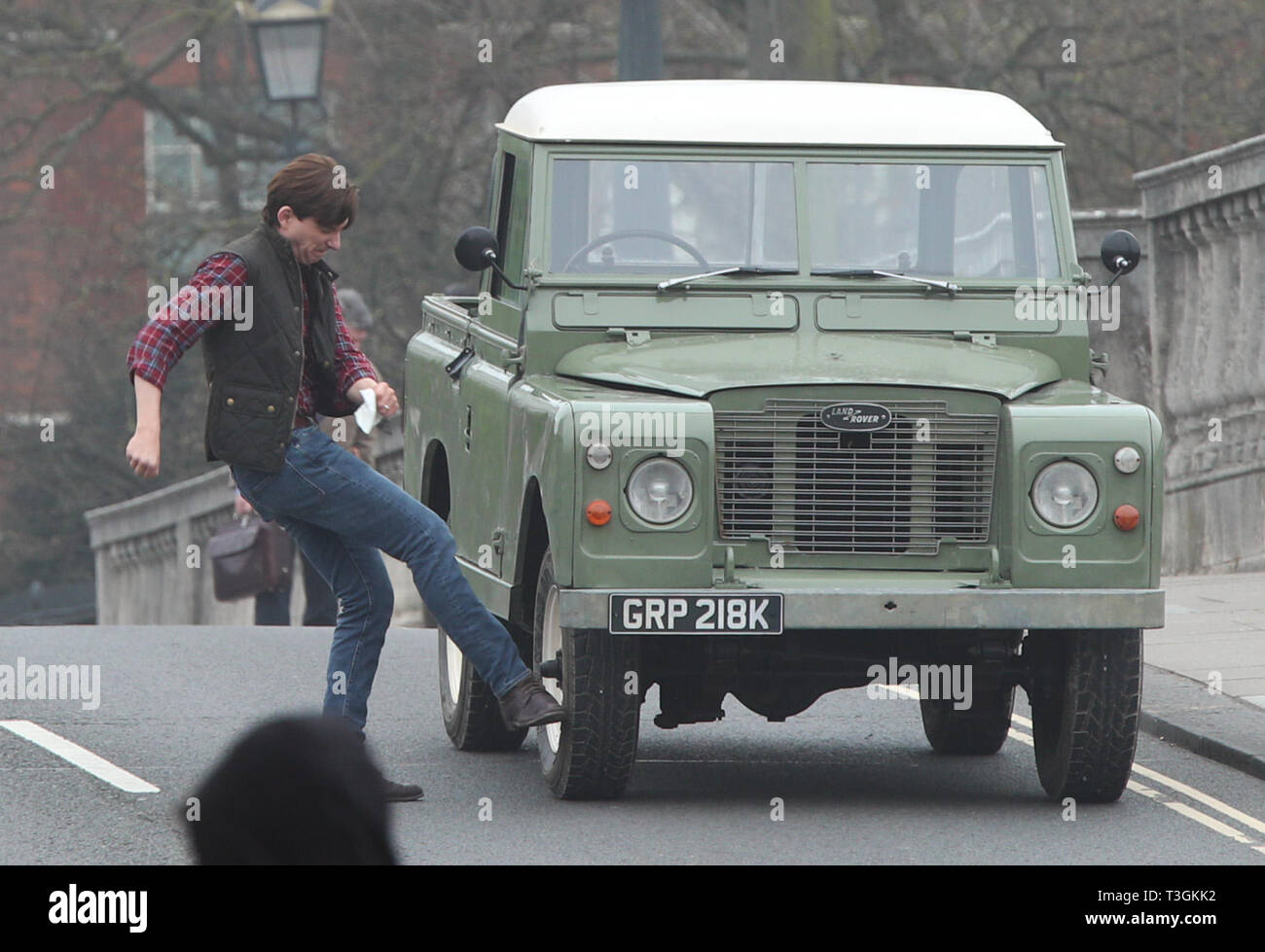 Peter Rabbit Range Rover Cast member Domhnall Gleeson kicking his car during the filming of a ...