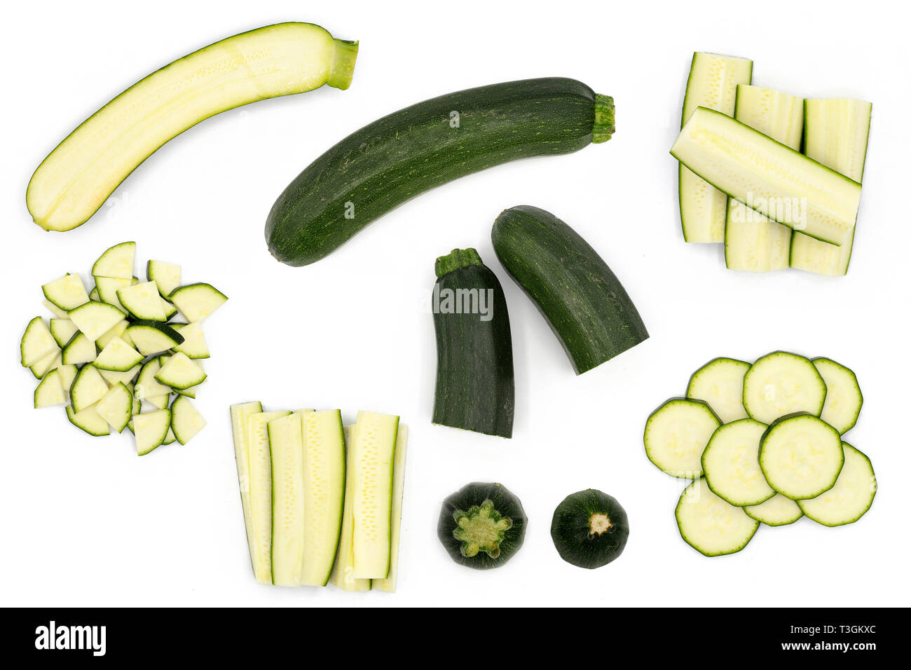 Set of fresh whole and sliced zucchini - isolated on white Stock Photo