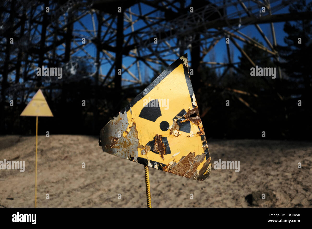 Radiation warning sign in the Chernobyl exclusion zone, Ukraine, April 2019 Stock Photo