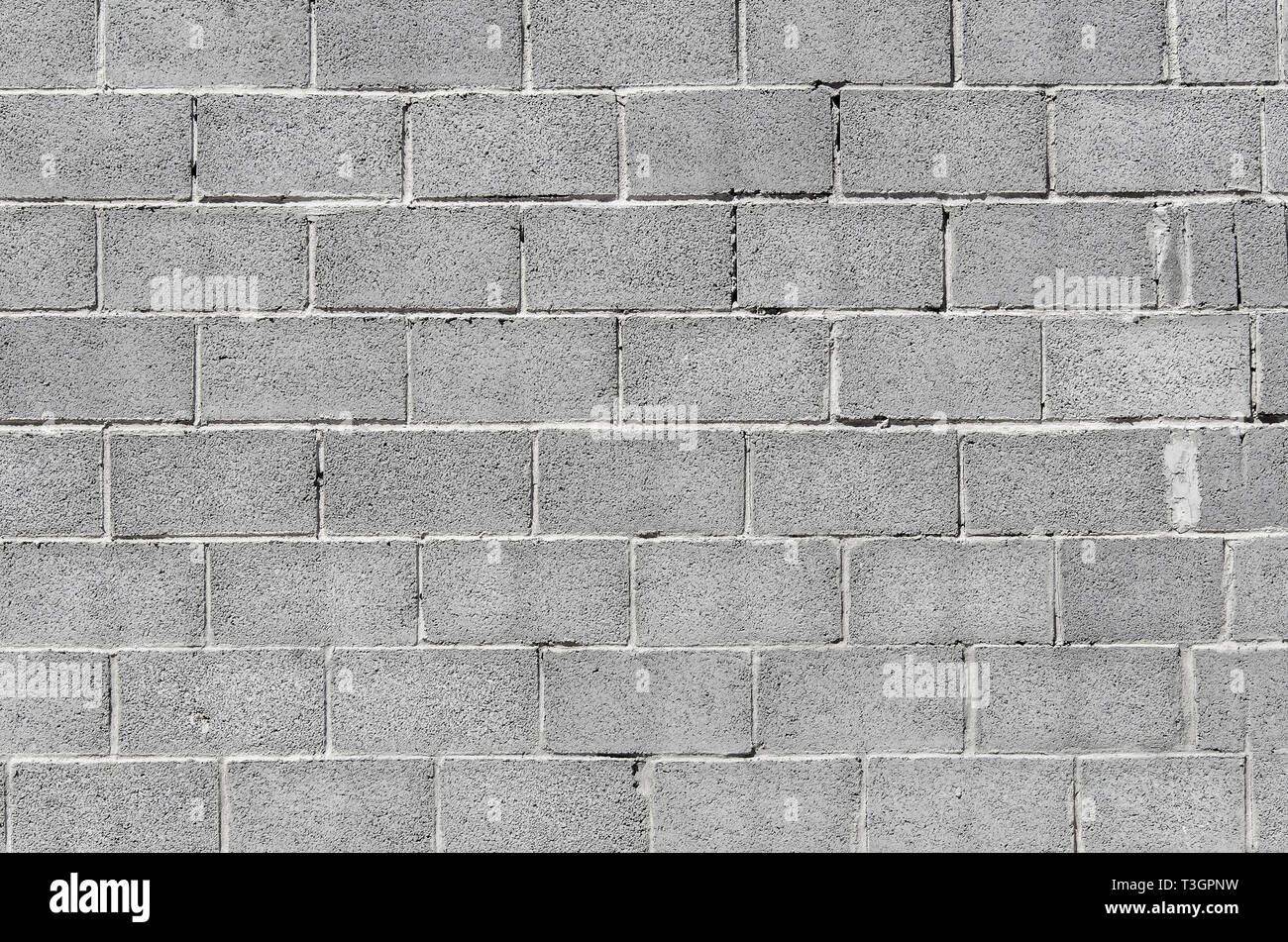 Wall of gray concrete blocks Stock Photo Alamy