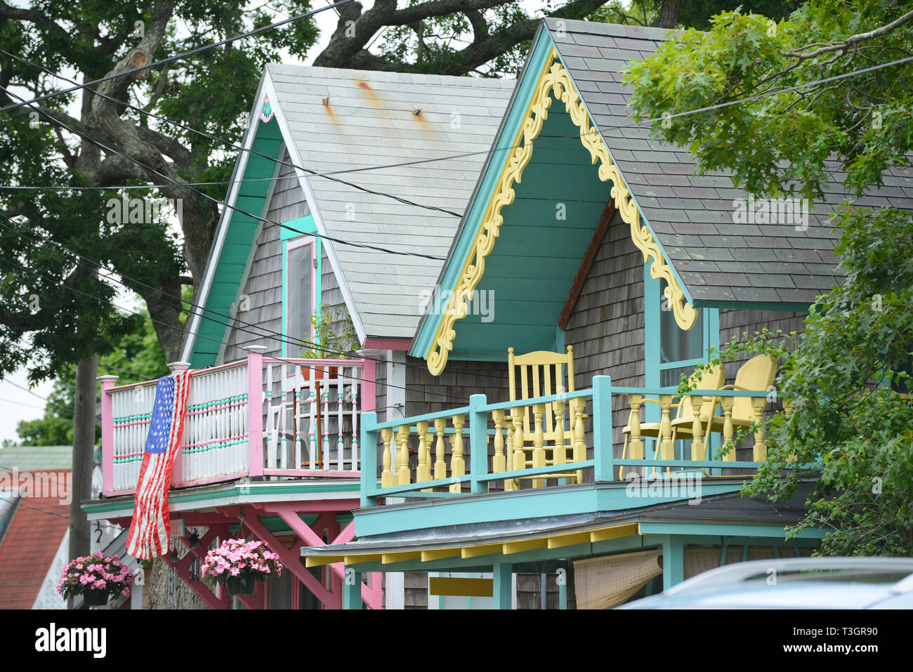 Carpenter Gothic Cottages with Victorian style, gingerbread trim in Wesleyan Grove, town of Oak Bluffs on Martha's Vineyard, Massachusetts, USA. Stock Photo