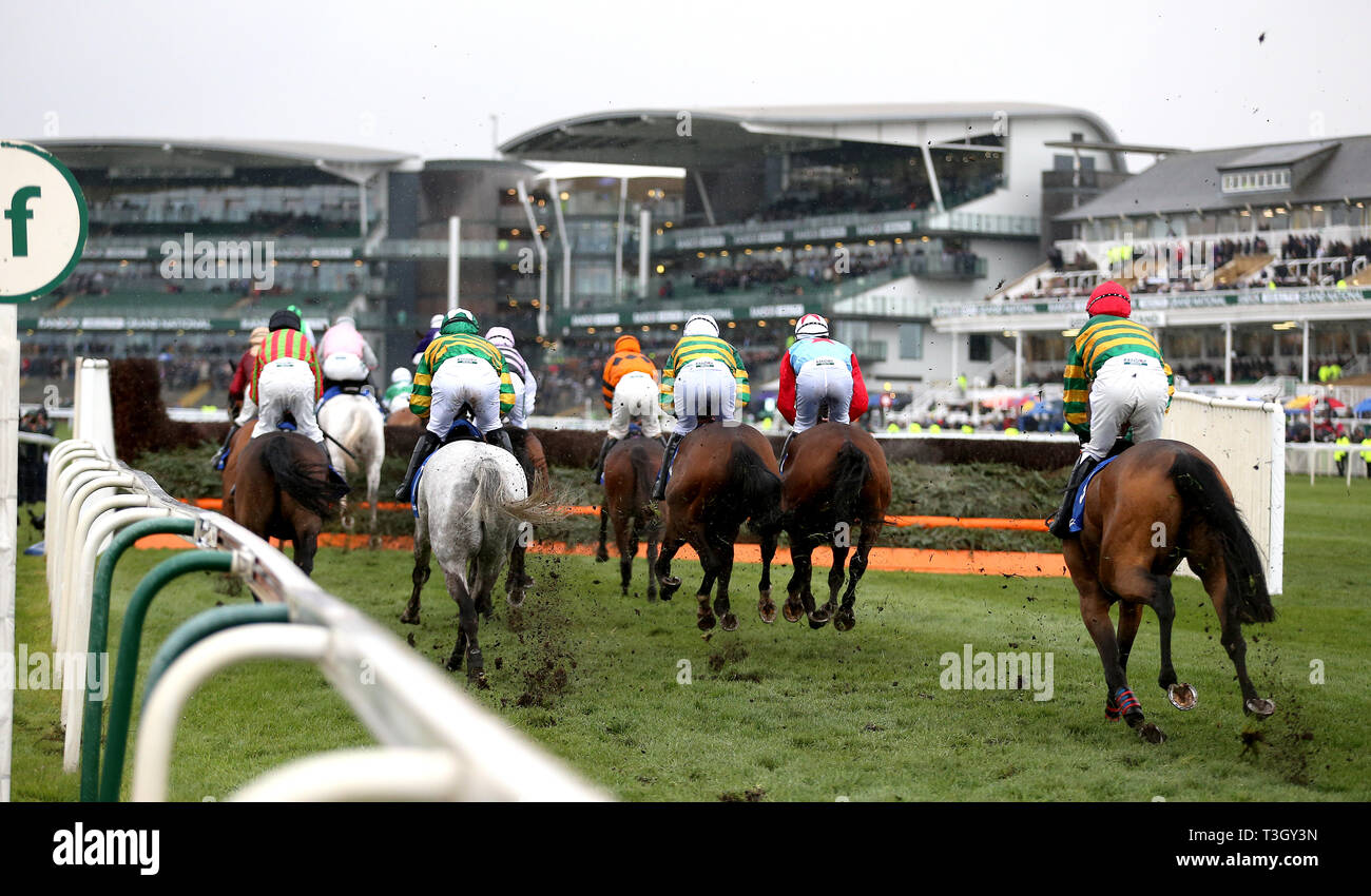 Runners and riders in the Close Brothers Red Rum Handicap Chase during Grand National Thursday of the 2019 Randox Health Grand National Festival at Aintree Racecourse. Stock Photo
