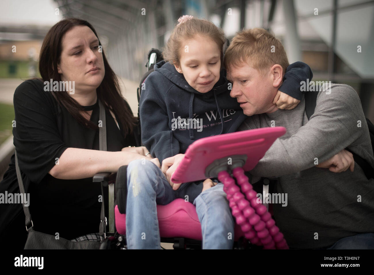 Emma Appleby (left), Lee Moore and their daughter Teagan who has severe epilepsy and was prescribed a cannabis-based medicine but has not been able to access it on the NHS, at London Southend Airport, Essex, after having the medicine they purchased in Amsterdam confiscated by customs officers. Stock Photo