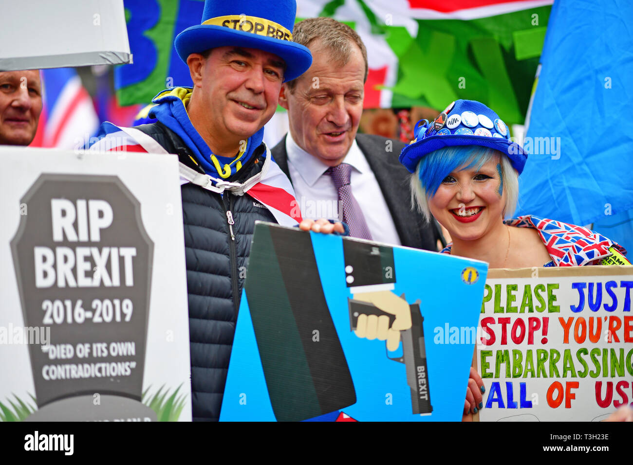 Left to right; Pro-EU protester Steve Bray, Alastair Campbell and Madeleina Kay, aka EU Supergirl, outside the Houses of Parliament in Westminster. Stock Photo