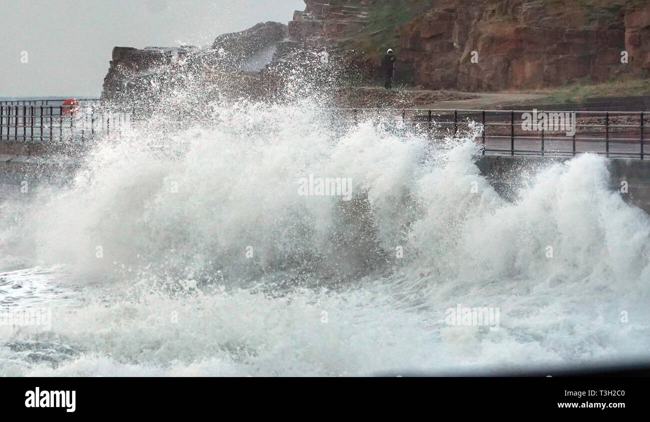 Waves crashing along the sea front at Cullercoats, North Tyneside. Stock Photo