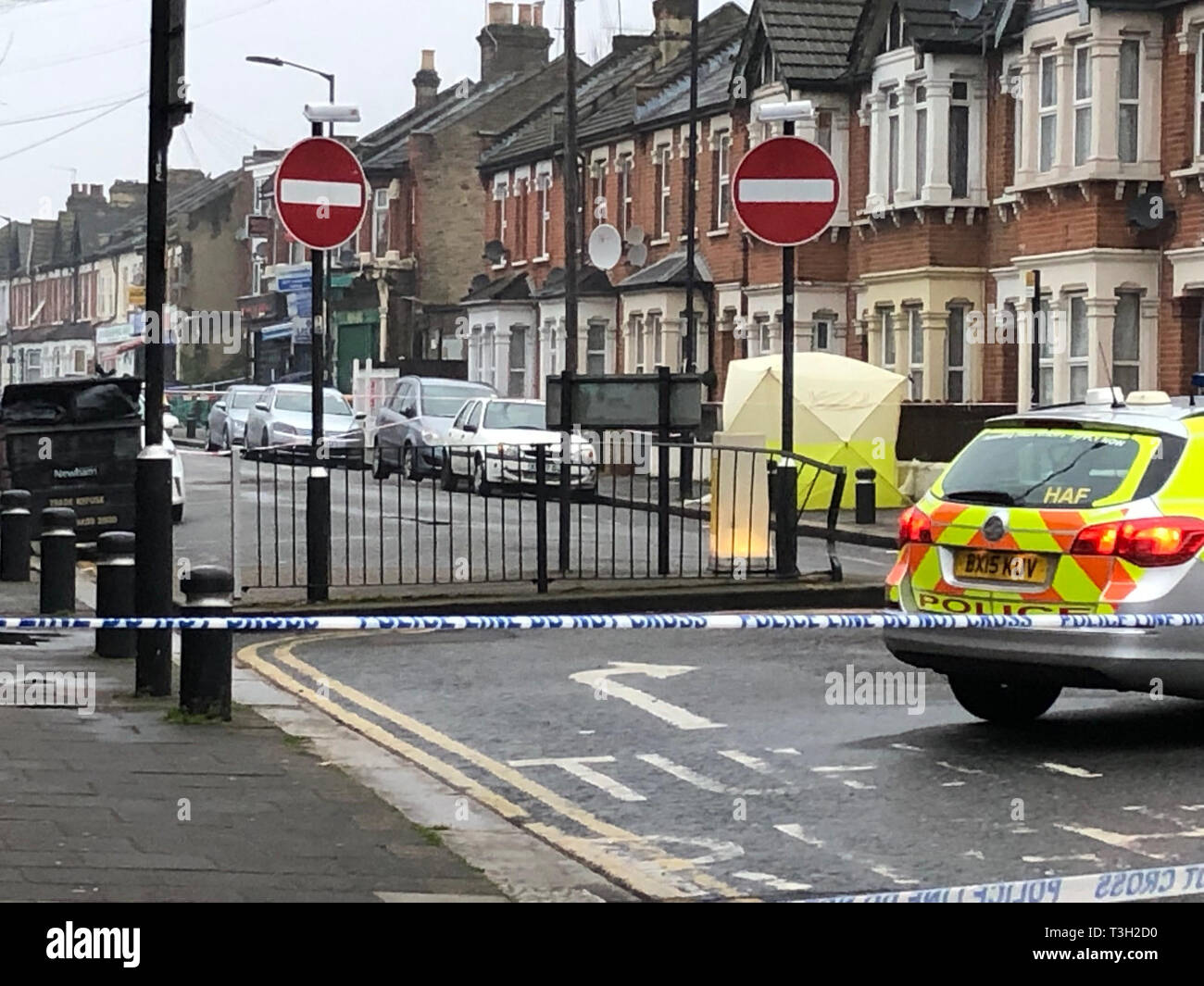 Police at the scene where a man in his 20s died of gunshot and stab ...