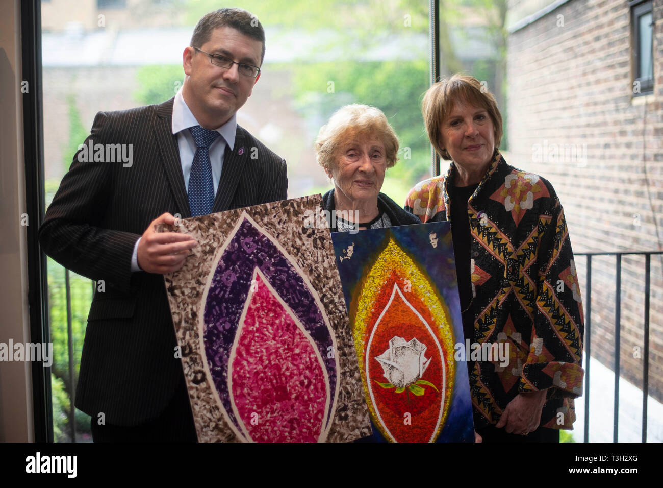 (left to right) Safet Vukalic, survivor of the Genocide in Bosnia, and Susan Pollack, survivor of Auschwitz, with Dame Penelope Wilton, during the launch for Holocaust Memorial Day 2020 in London, marking the 75th anniversary of the liberation of Auschwitz. Stock Photo