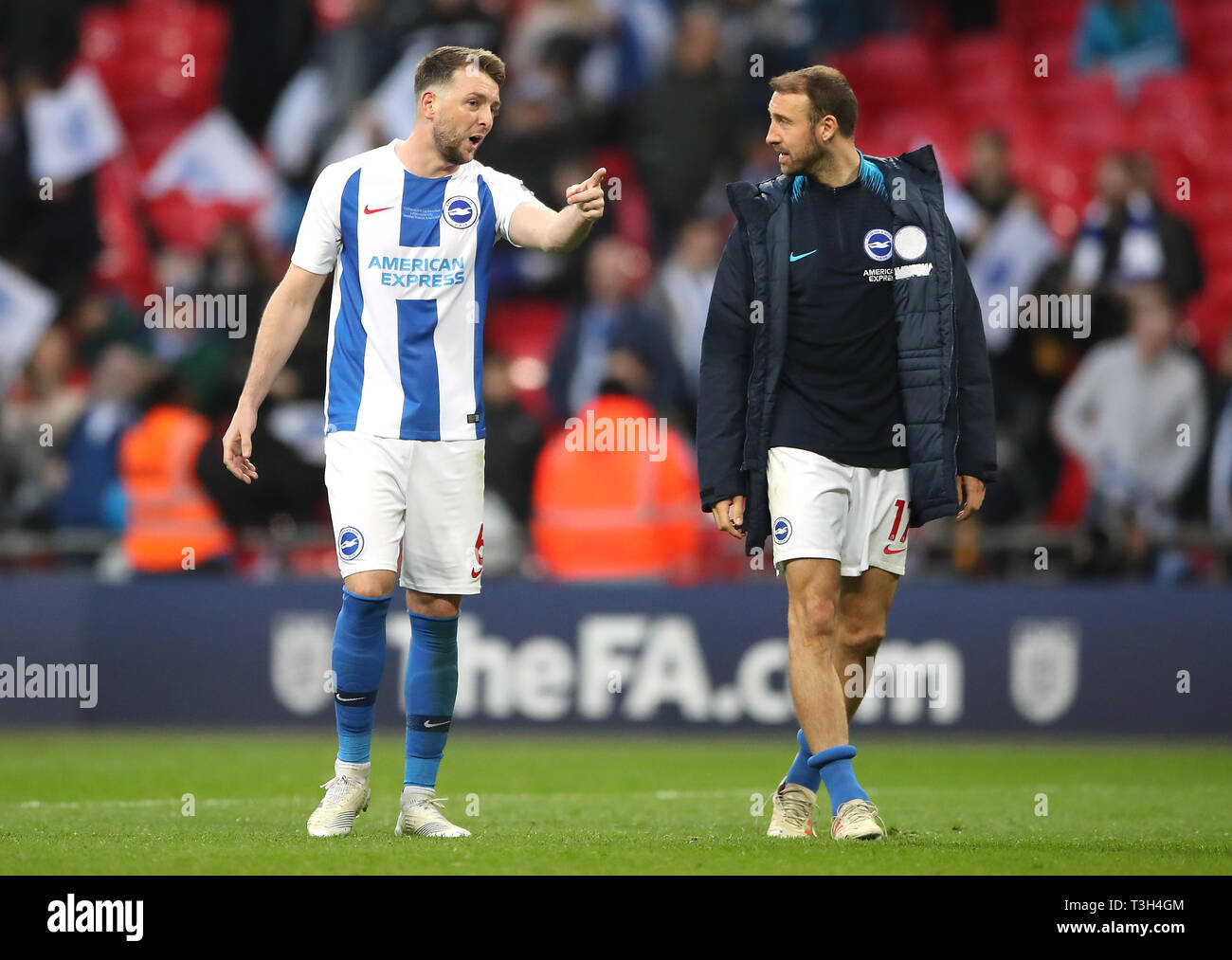 Brighton & Hove Albion's Dale Stephens (left) and Glenn Murray after the final whistle during the FA Cup semi final match at Wembley Stadium, London. Stock Photo