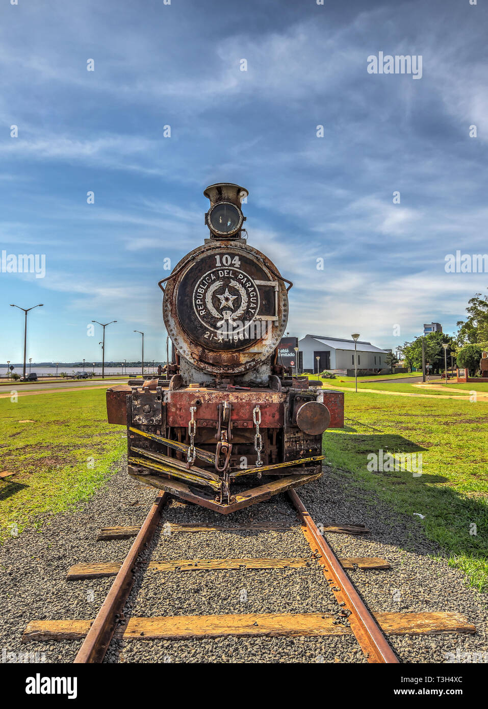 Encarnacion, Paraguay - November 14, 2018: Old rusted steam locomotive in Encarnacion. In Paraguay there is no more rail traffic today. Stock Photo