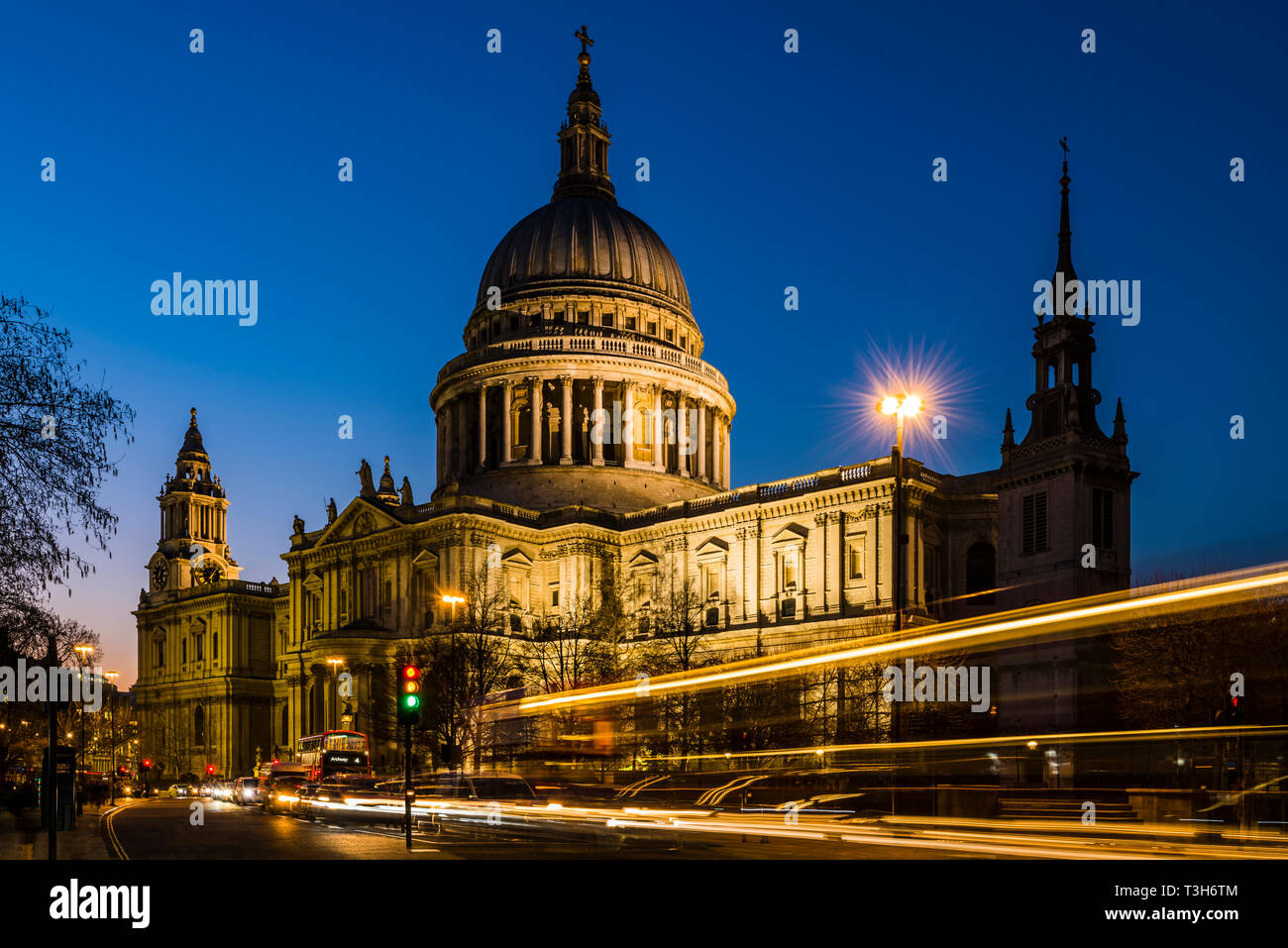 Traffic in front of St Paul's Cathedral at dusk, London, UK Stock Photo