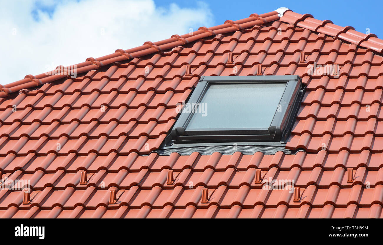 Skylight window on modern house rooftop Stock Photo Alamy
