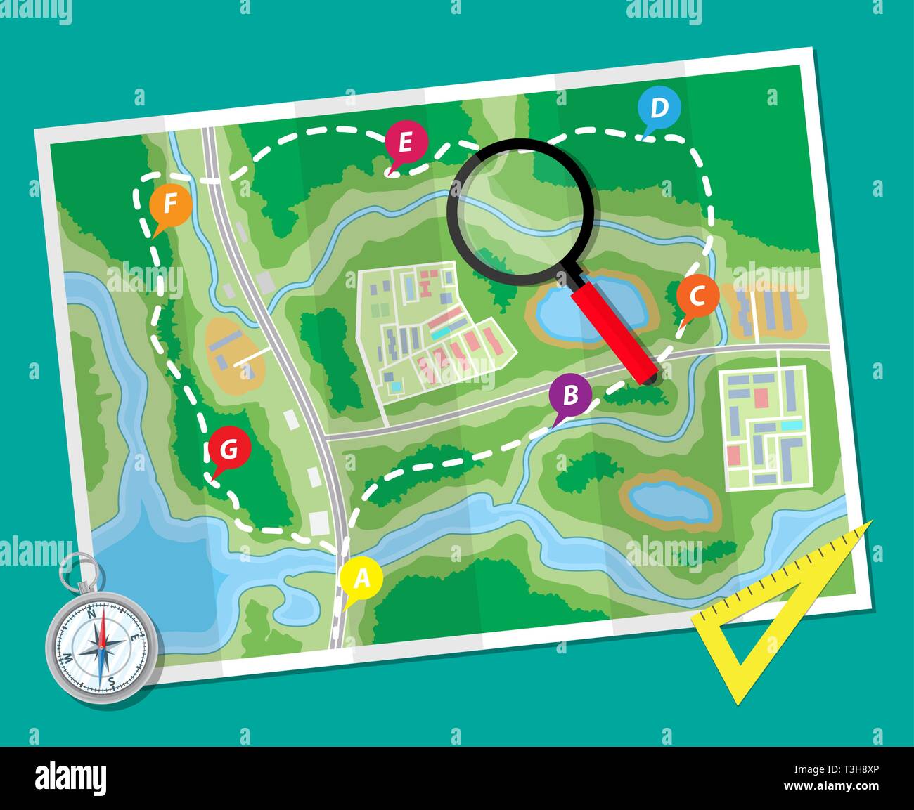Paper map with compass, magnifying glass and ruler. Planning trip ...