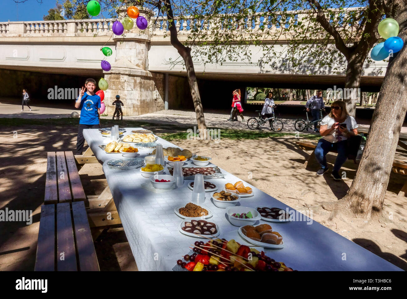 Picnic and children's birthday party in Turia gardens Valencia Spain Europe Stock Photo