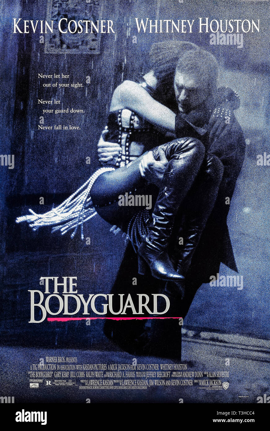 The Bodyguard (1992) directed by Mick Jackson and starring Kevin Costner, Whitney Houston and Gary Kemp. A bodyguard falls in love with a pop singer he is hired to protect against a stalker. Stock Photo