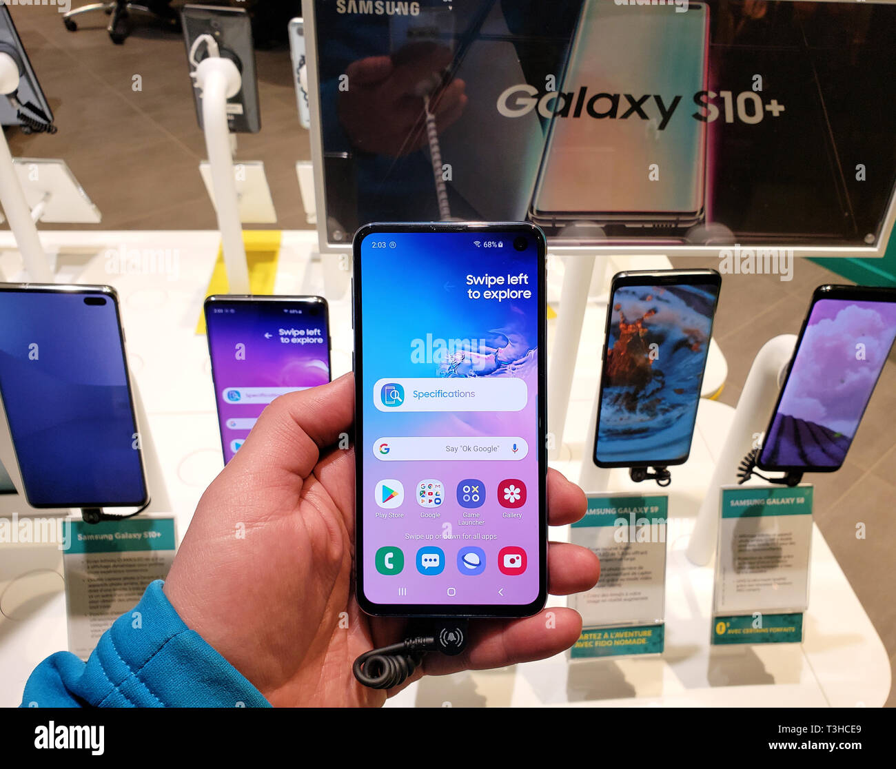 MONTREAL, CANADA - MARCH 28, 2019: Samsung Galaxy s10 in a hand at mobile store. Samsung Galaxy is a line of mobile devices made by Samsung. Stock Photo