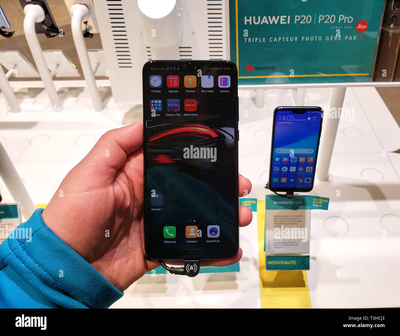 MONTREAL, CANADA - MARCH 28, 2019: Huawei p20 pro cell phone in a hand at a local mobile store. Huawei is a Chinese multinational telecommunications e Stock Photo