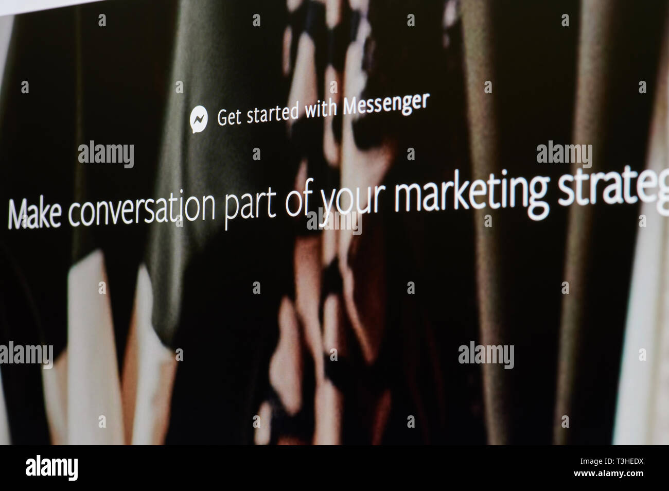 New york, USA - april 8, 2019: Get started with facebook messenger ads on digital screen macro close up view Stock Photo