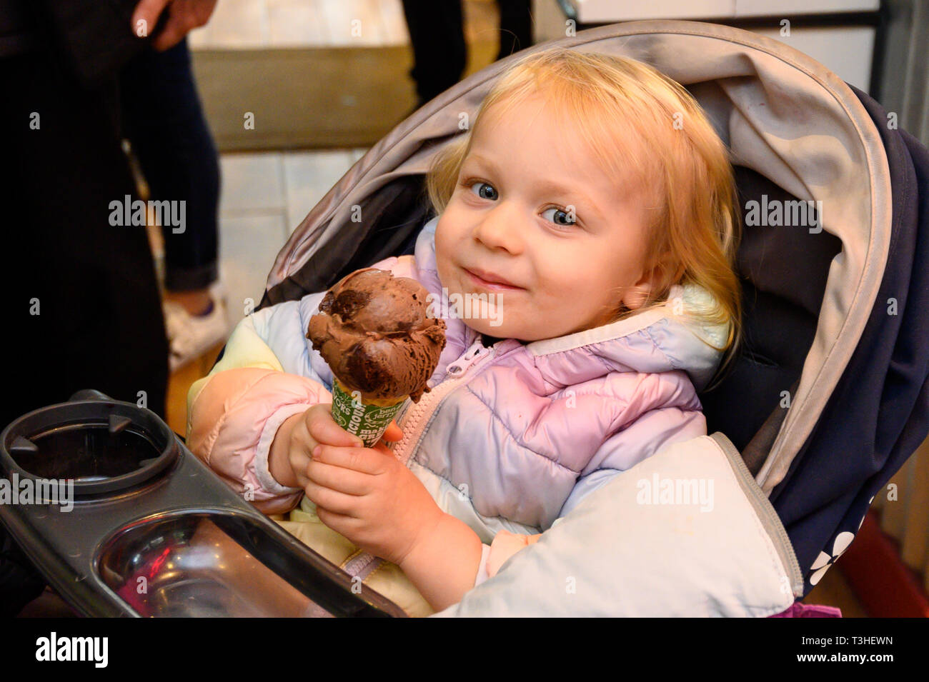 A kid seen with ice cream during the Ben & Jerry's Free Cone Day at the