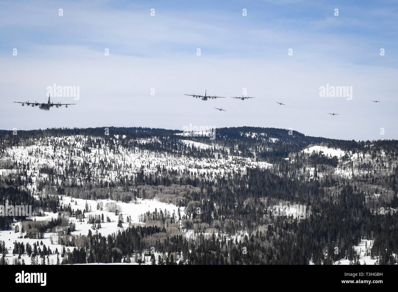 A formation of MC130J Commando II’s fly over mountains near Albuquerque, N.M., Apr. 2, 2019
