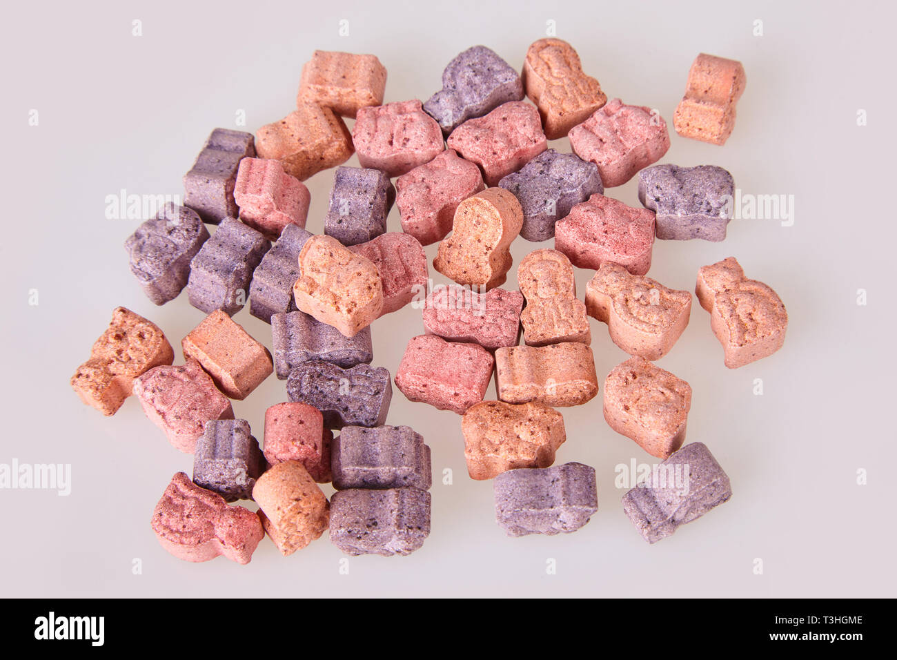 Various vitamins for kids on a white background. Studio lights