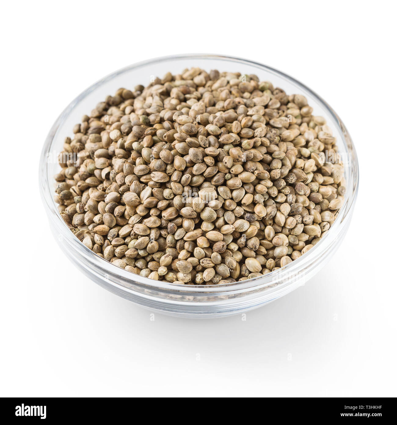 Bowl of hemp seeds isolated on white Stock Photo - Alamy