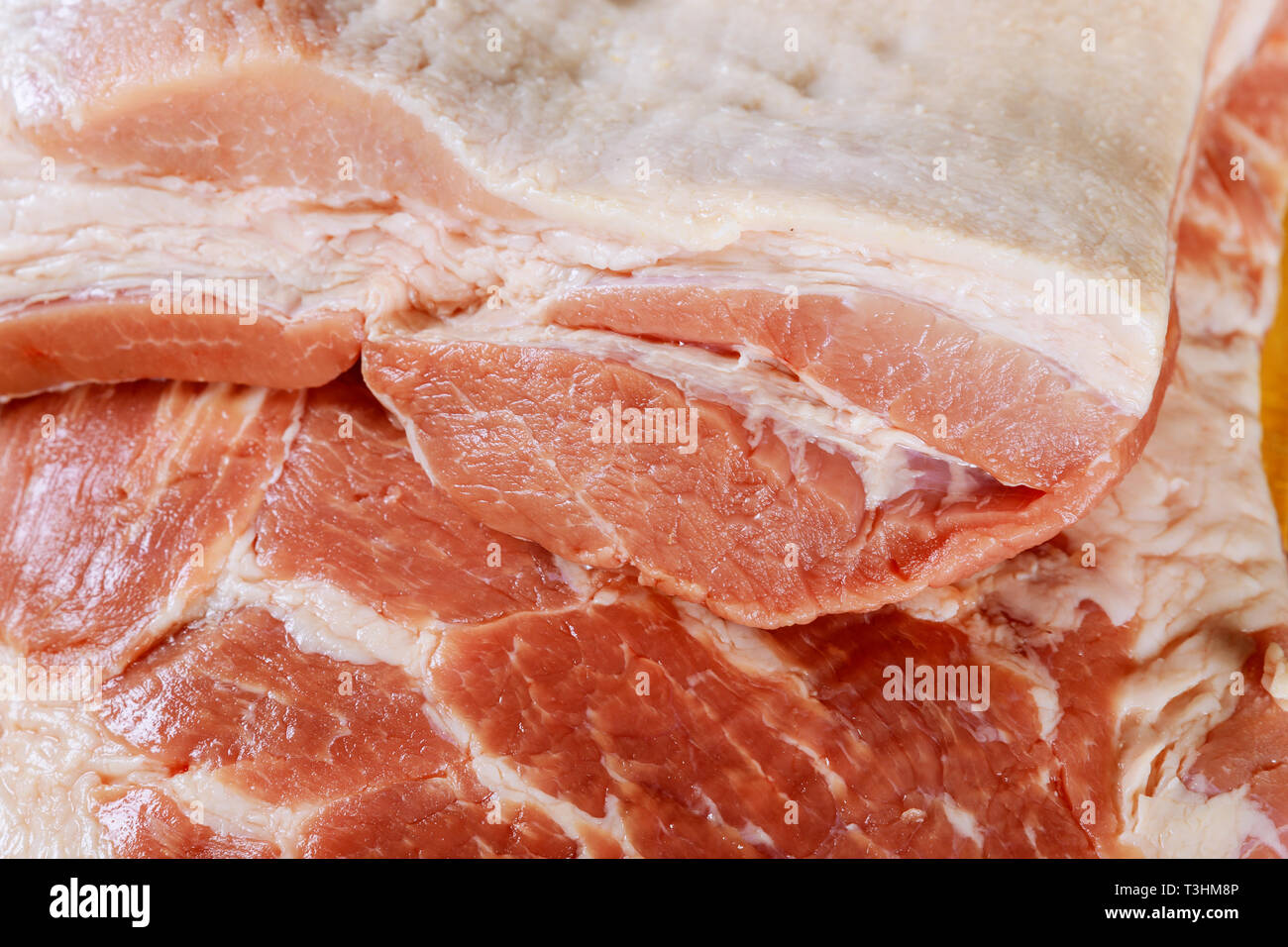 Fresh raw meat pork chops uncooked uncut ready Stock Photo Alamy