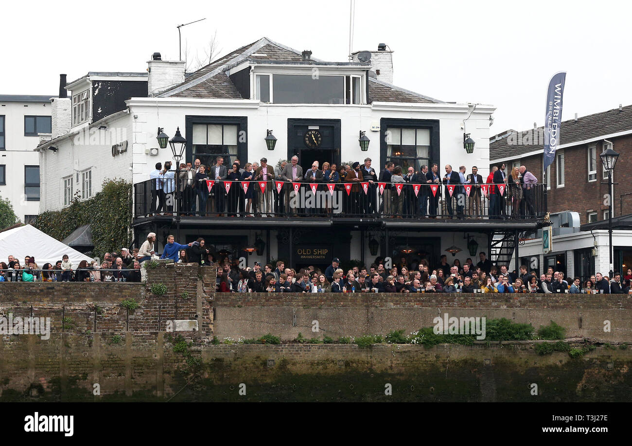 Crowd outside the Old Ship pub during the Women's Boat Race on the River Thames, London. Stock Photo