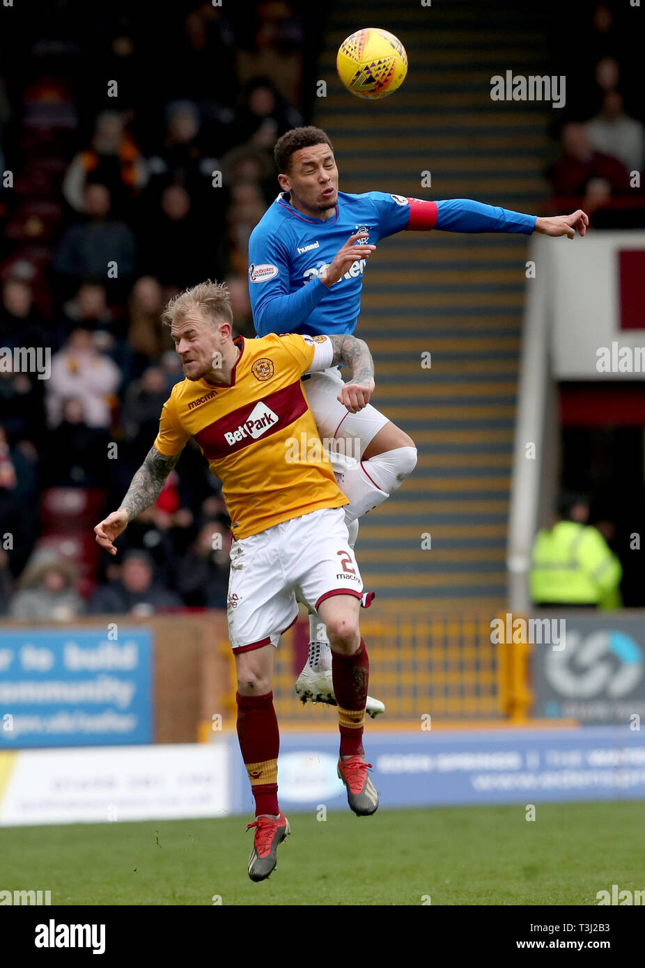 Motherwell's Richard Tait and Rangers' James Tavernier battle for the ball during the Ladbrokes Scottish Premiership match at Fir Park, Motherwell. Stock Photo