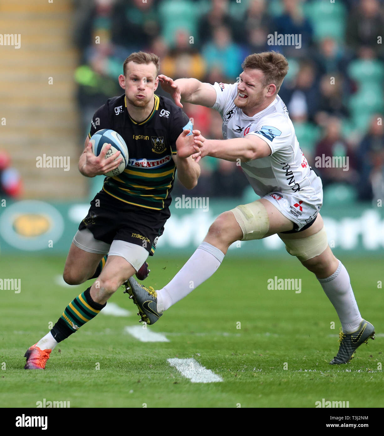 Northampton Saints' Rory Hutchinson in action with Gloucester's Tom Savage during the Gallagher Premiership match at Franklin's Gardens, Northampton. Stock Photo