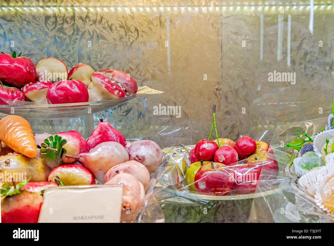 Pastry with marzipan in the form of fruit and fish. Typical Sicilian. Stock Photo