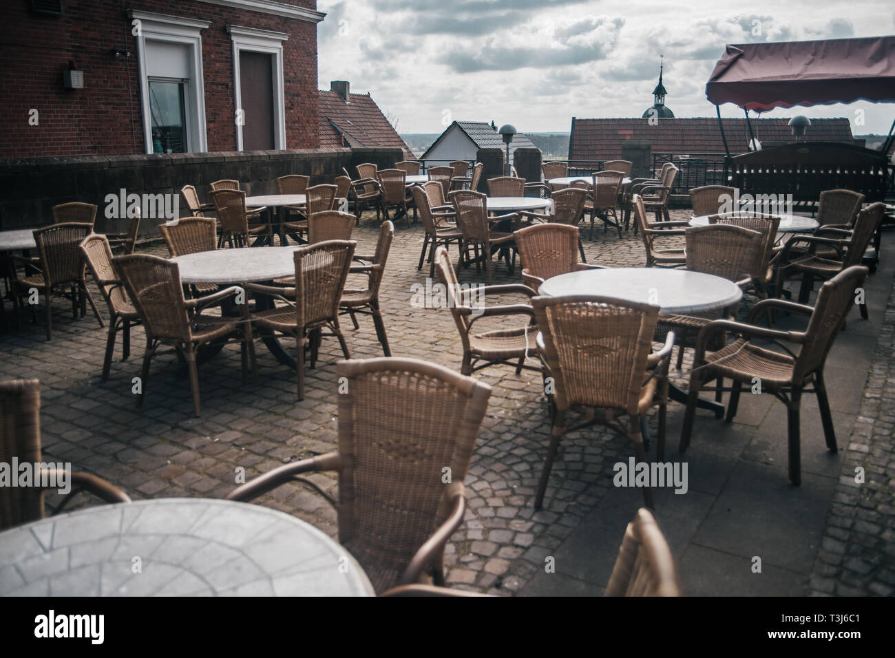 View of empty outdoor cafe in Bad Bentheim, Germany, with cozy decorations Stock Photo