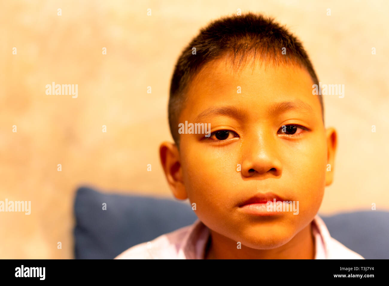 Portrait of asian boy crying with tear on his face. Stock Photo