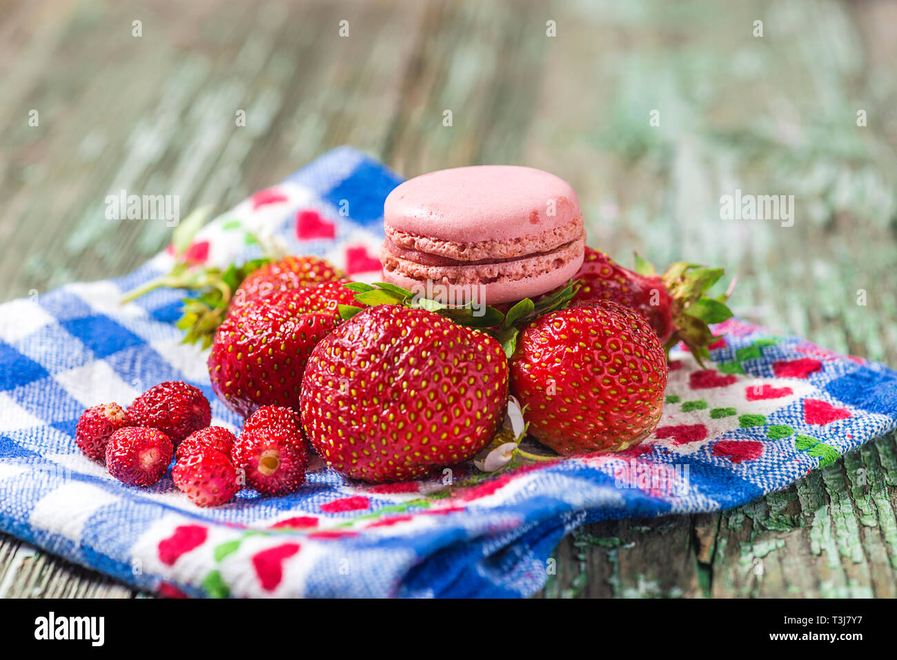 Delicious strawberries and macaroon Stock Photo