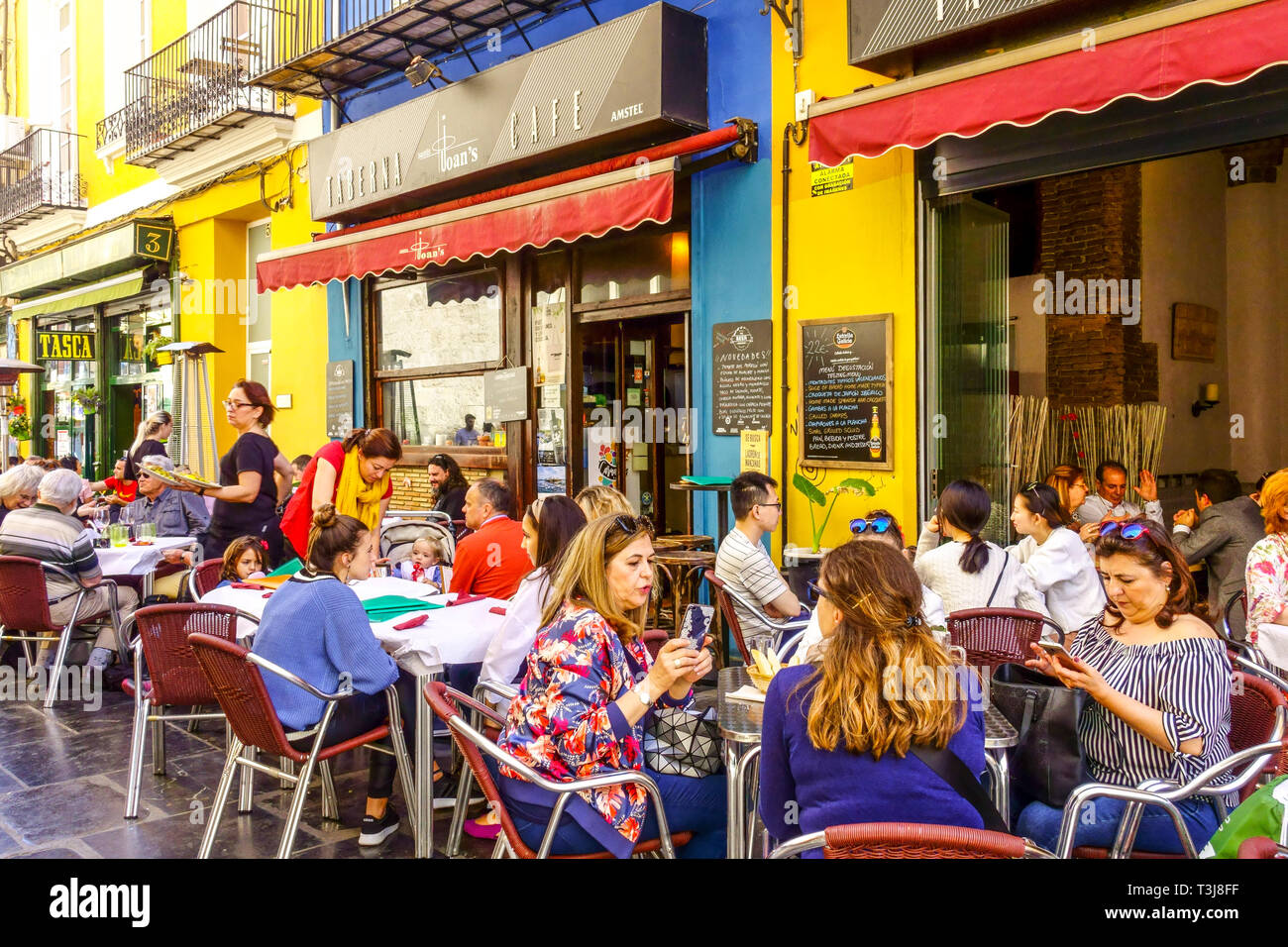 Valencia cafe Spain, People outside Tapas Bar Sants Joan´s, sidewalk