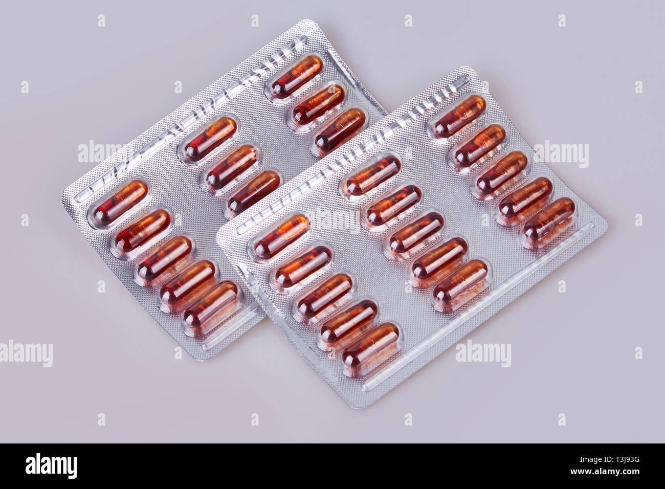 Krill oil capsules in blister pack isolated on white background Stock Photo