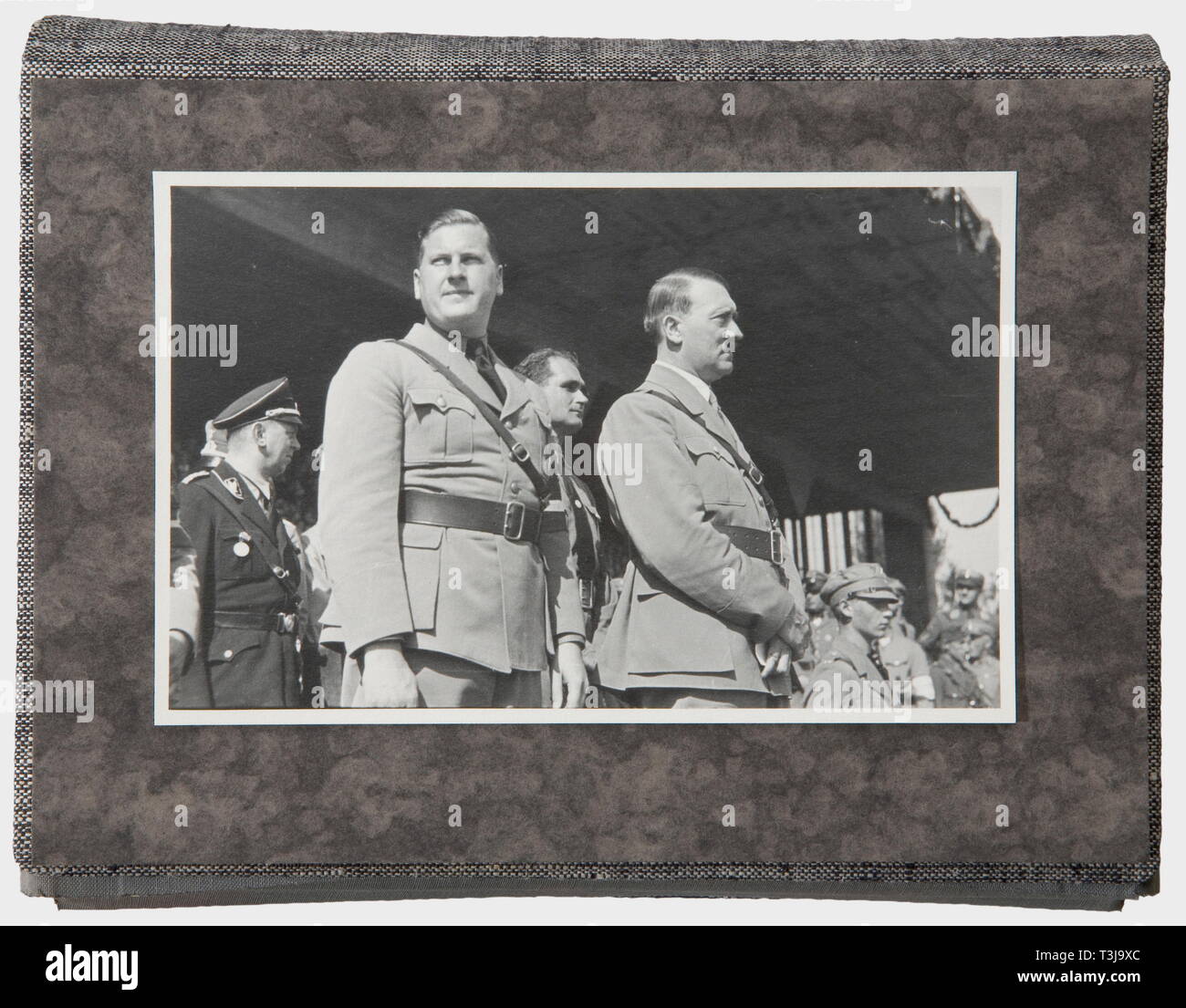 Rudolf Heß, a large photo file and three photo memory albums HJ Photo file with 45 pictures (13.4 x 20.8 cm) of a large HJ tent camp, ca. 1935/36, visited by Adolf Hitler, Baldur von Schirach, Rudolf Heß, Joseph Goebbels and foreign delegates. Photo album no. 1 commemorating the visit of Stahleck Castle near Bacharach on the Rhine on 12th April 1937, 26 pictures, dedication, and signature of the state director of the HJ federation. Photo album no. 2 with pictures of Heß' visit to the Rhine Youth Hostel Association in Düsseldorf, 23 photos, dedication and signature of the Ha, Editorial-Use-Only Stock Photo