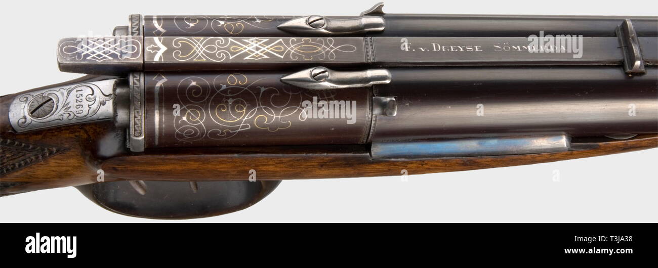 A pin-fire double-barrelled gun with rifled chambers, F. v. Dreyse. 18 mm calibre, no. 15269. Fixed rear sight and nickel-silver front sight. Mirror-like bores without rifling. The bullet spin is brought about by the rifling within the chambers. Barrel surfaces lightly reworked and newly finished. Lever action which swings barrels to the right for loading. The company name on barrel inlaid with silver 'F. v. Dreyse'. Locks with fine silver wire inlay. Iron furniture with ornamental and flower engraving. Selected walnut stock with fine chequering,, Additional-Rights-Clearance-Info-Not-Available Stock Photo