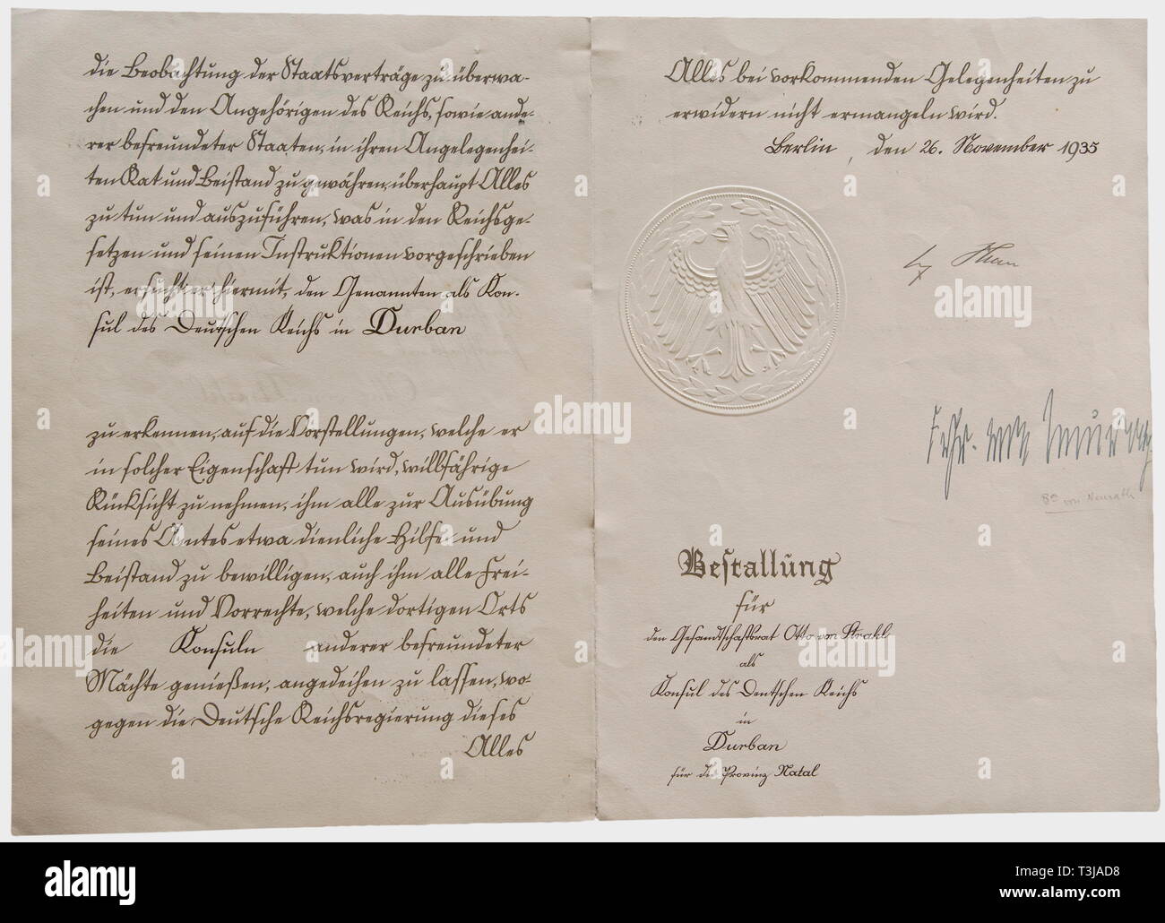 A certificate appointing Otto von Strahl, Consul of the German Reich in Durban A four-page certificate with a large stamped national eagle, signed 'Adolf Hitler' and 'Frhr. Baron von Neurath' in ink. Berlin 26 November 1935. Interesting, early certificate. Konstantin Freiherr von Neurath, German Foreign Minister from 1932 to 1938. Durban, Province of Natal, part of the British Cape Colony, is today the second largest city in South Africa. historic, historical, 1930s, 20th century, diplomacy, organisation, organization, organizations, organisations, Diplom, No-Exclusive-Use | Editorial-Use-Only Stock Photo