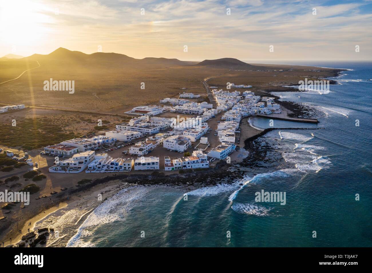 Caleta de Famara at sunset, drone shot, Lanzarote, Canary Islands, Spain Stock Photo