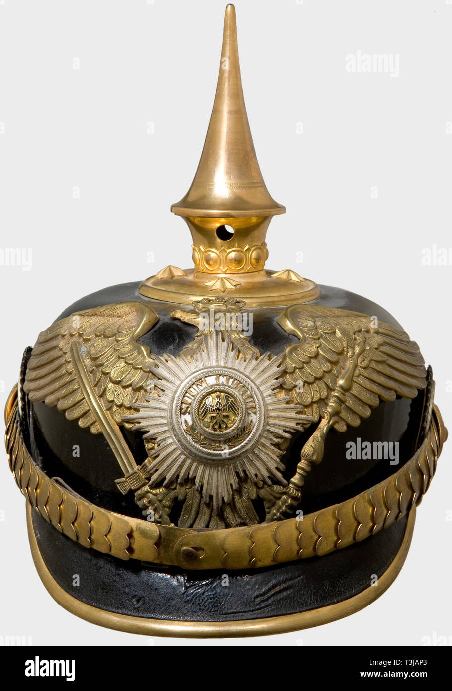 A helmet for an officer, of the Prussian Guard Train Battalion Black lacquered leather skull (age cracks) with gilt mountings, cambered metal chinscales, and guards eagle (worn by cleaning, pin resoldered) with a superimposed, silver-plated, enamelled star. Officer's cockades. The ribbed silk lining replaced. historic, historical, 19th century, Prussian, Prussia, German, Germany, militaria, military, object, objects, stills, clipping, clippings, cut out, cut-out, cut-outs, helmet, helmets, headpiece, headpieces, utensil, piece of equipment, utens, Additional-Rights-Clearance-Info-Not-Available Stock Photo