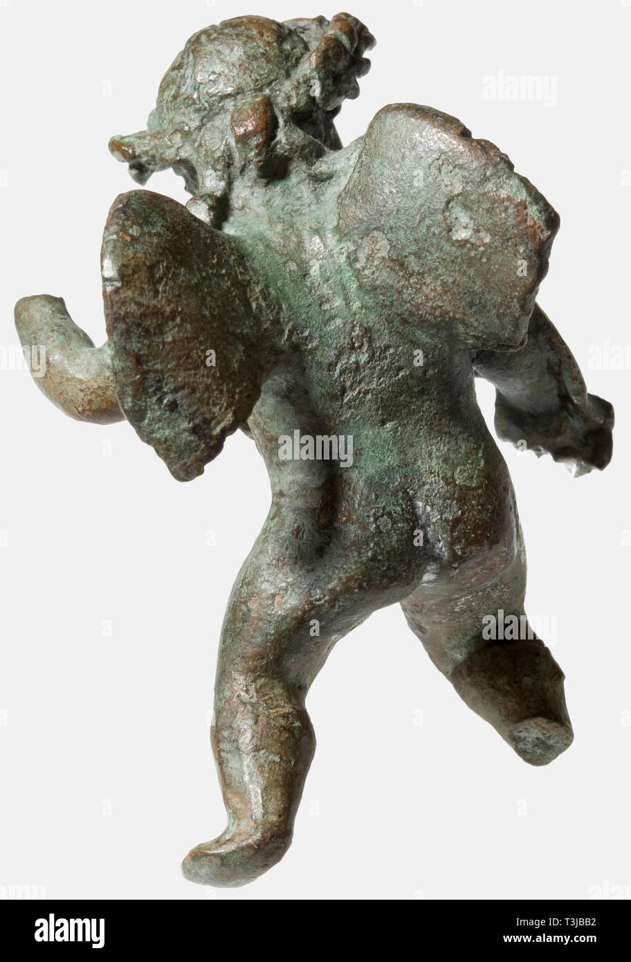 A Roman putto seated in riding position, 1st - 2nd century A.D. Cast bronze complemented by cold-working. The boy was probably originally riding a dolphin, the left arm raised, wearing around his neck a fruit garland, the head crowned with a leaf wreath, the finely modelled head with pierced eyes turned slightly to the left. Fine, dark green patina, the right foot and left hand missing, the wings slightly damaged. Height 7.8 cm. A well-crafted small bronze figure of Roman origin. Provenance: German private collection, 1970s. historic, historical,, Additional-Rights-Clearance-Info-Not-Available Stock Photo