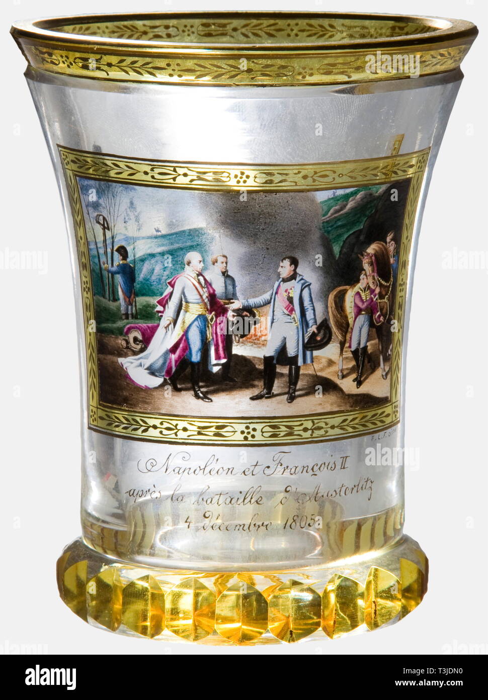 Napoleon and Francois II after the Battle of Austerlitz, a Viennese glass beaker, Fürchtegott Leberecht Fischer, circa 1900 Crystal glass flashed with yellow coloured glass in places and golden decoration. The front bears a transparent enamel painting showing the meeting between Napoleon and the Austrian Emperor Franz II on 4 December 1805 at Nasiedlowitz, signed, "F.L.F. pinx" at the lower left above the title and date, "4 décembre 1805." A circular lens ground on the back, and a protuding serrated 'cogwheel' base ring as well as a star ground i, Additional-Rights-Clearance-Info-Not-Available Stock Photo