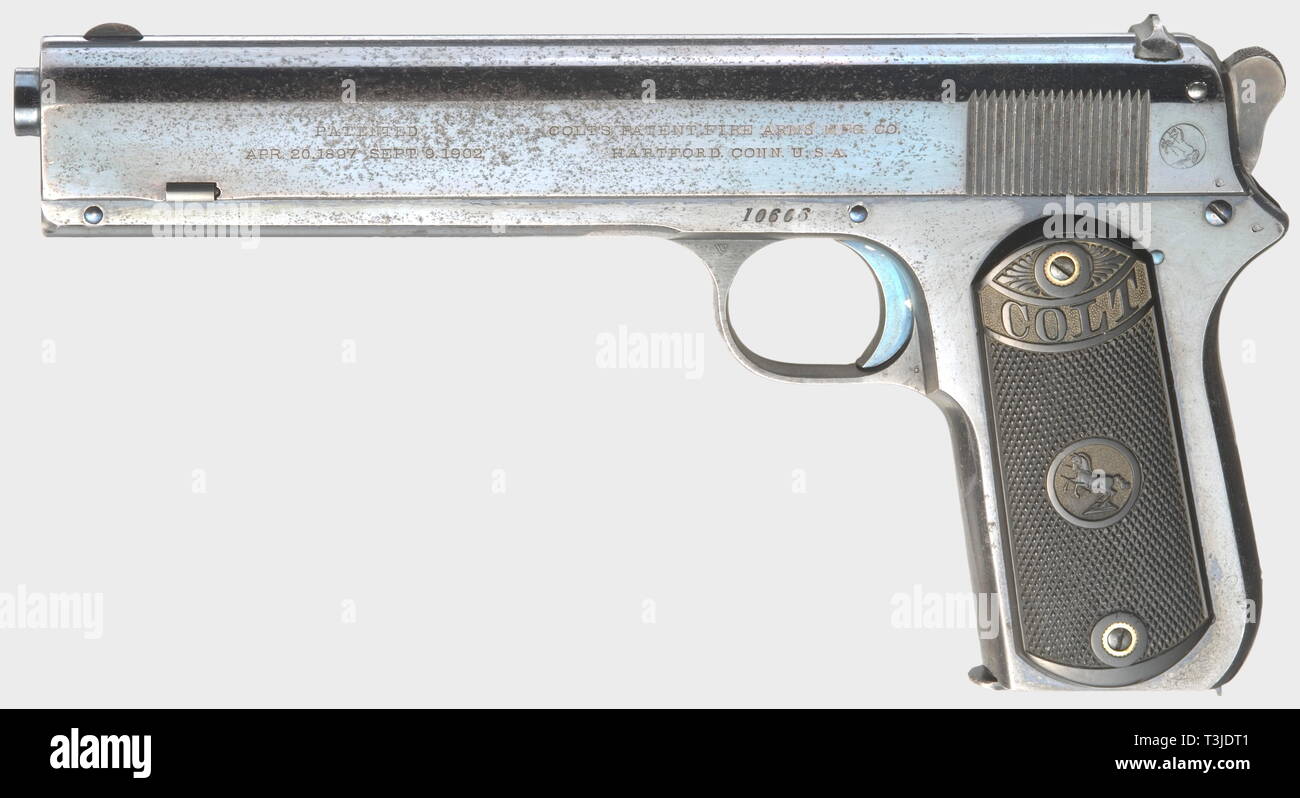 A Colt model 1902 (sporting) automatic pistol, cal..38 ACP, no. 10606. Mirror-like bore, length 6'. 7-shot. Manufactured in 1907. Left and right on slide standard inscription of that serial number section. Original Colt blue-black high gloss finish with light wear marks on edges. Left slide side partially slightly spotty, right side just fine. Colour case hardened hammer. Flawless black and decorative hard rubber grip panels carrying rampant colt and 'COLT'. A rare collector's item in very good condition. Total manufacture of only 7500 weapons. T, Additional-Rights-Clearance-Info-Not-Available Stock Photo