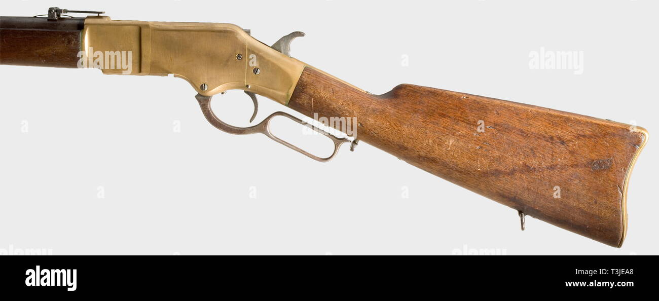 A Winchester model 1866 musket, 3rd pattern. .44 RF calibre, serial number 94273. 24 1/2 inch barrel (slightly shortened) with a 24 inch magazine. Bright bore with a weak land/groove profile. Standard inscriptions, fixed sights, and brass receiver. The serial number and 'H L' are stamped behind the trigger. Walnut stock with iron/brass furniture. One barrel ring has been reworked or is a replacement. Length 110 cm. Erwerbsscheinpflichtig. historic, historical, 19th century, civil long guns, gun, weapons, arms, weapon, arm, firearm, fire arm, gun,, Additional-Rights-Clearance-Info-Not-Available Stock Photo